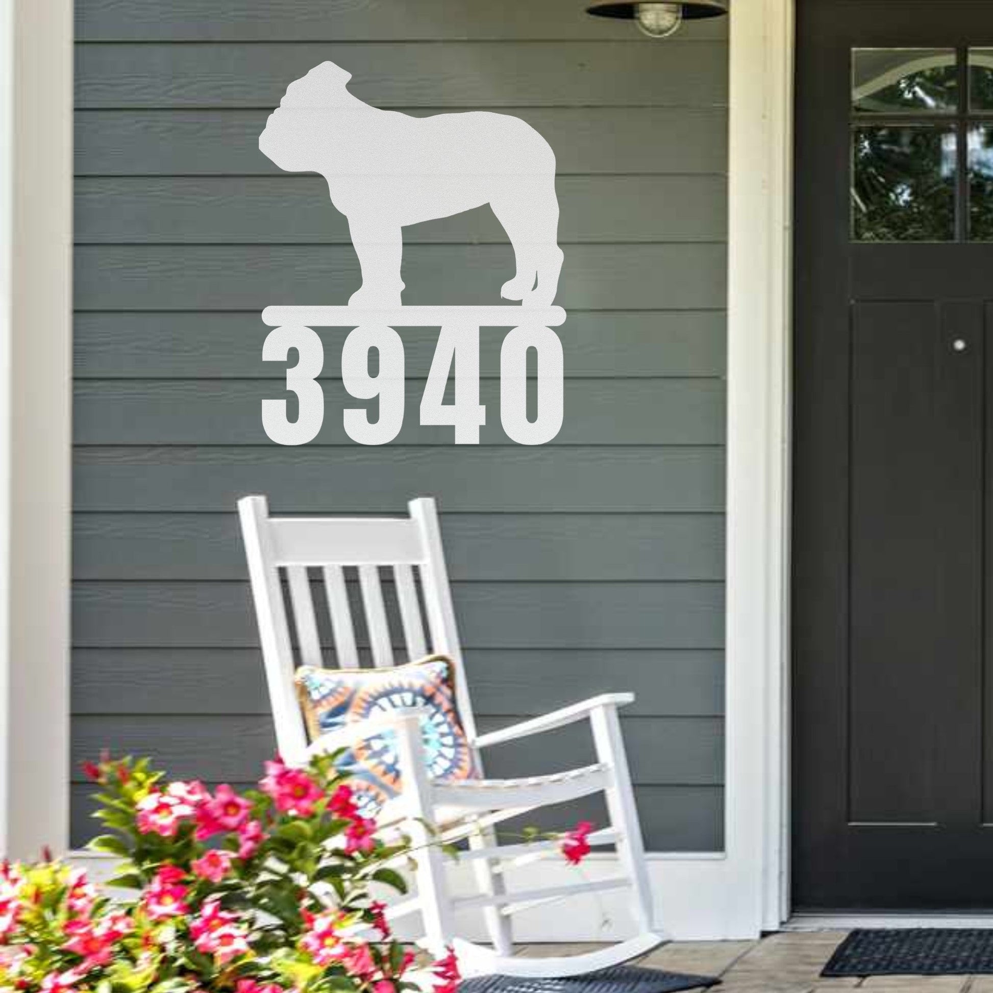 Destination English Bulldog Home Metal House Number Sign hanging next to front door on porch